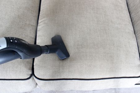 What is the best way to clean a fabric sofa