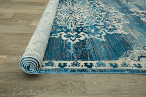 How often should Persian rugs be cleaned